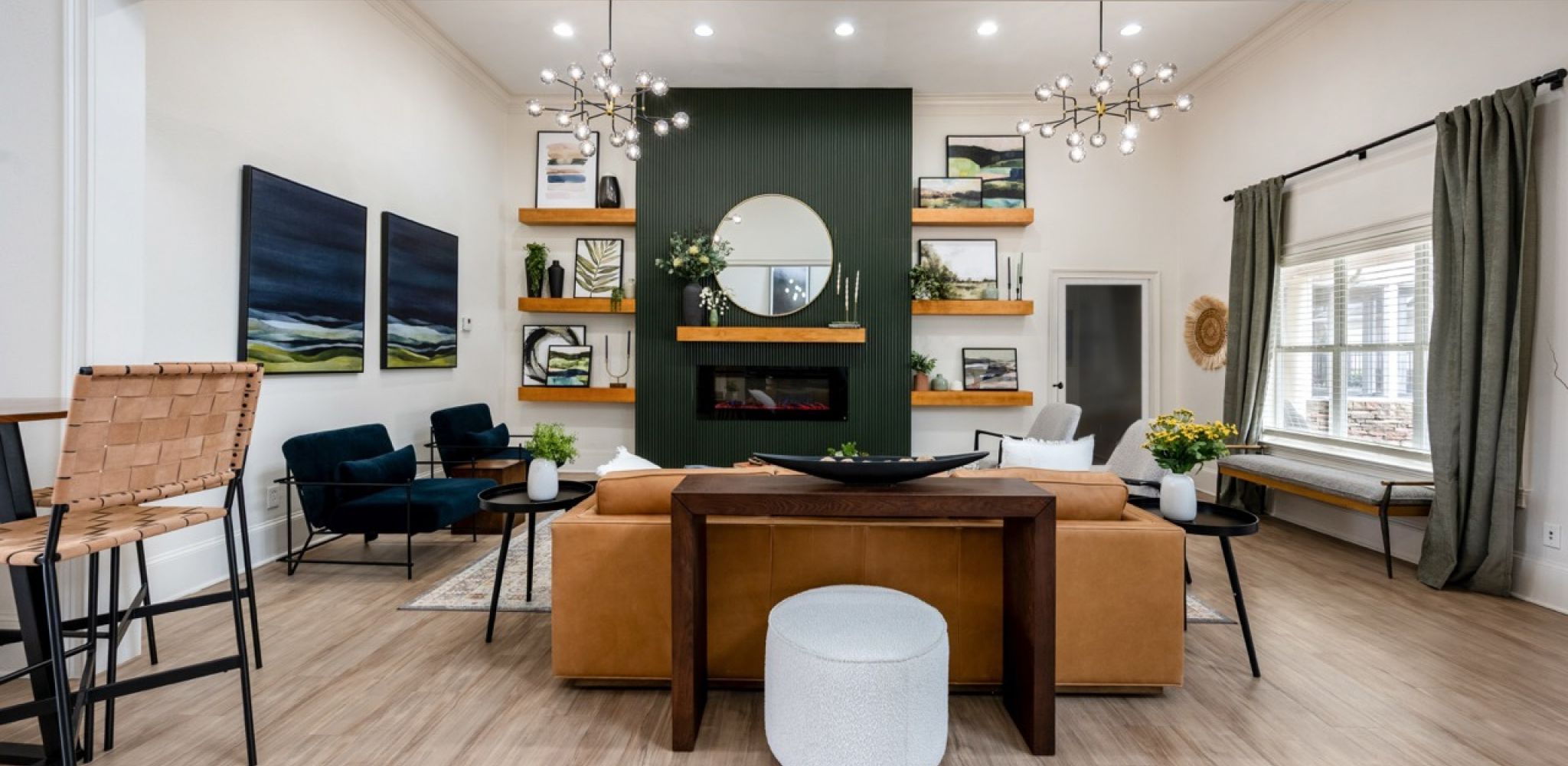 Hawthorne at Kennesaw apartment living room with large patio door, furnished with a couch, coffee table, and chair