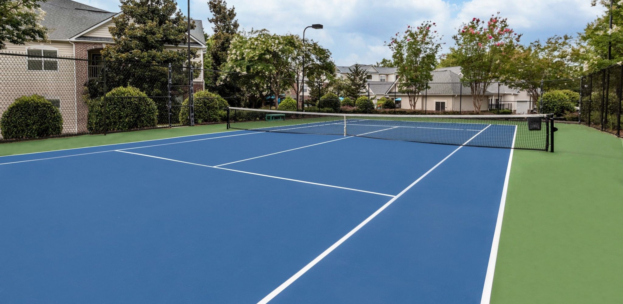 Hawthorne at Kennesaw outdoor tennis court and surrounding landscaping